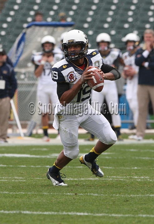 122912 Kraft SA-034.JPG - Dec 29, 2012; San Francisco, CA, USA; Navy Midshipmen quarterback Keenan Reynolds rolls out against the Arizona State Sun Devils in the 2012 Kraft Fighting Hunger Bowl at AT&T Park.